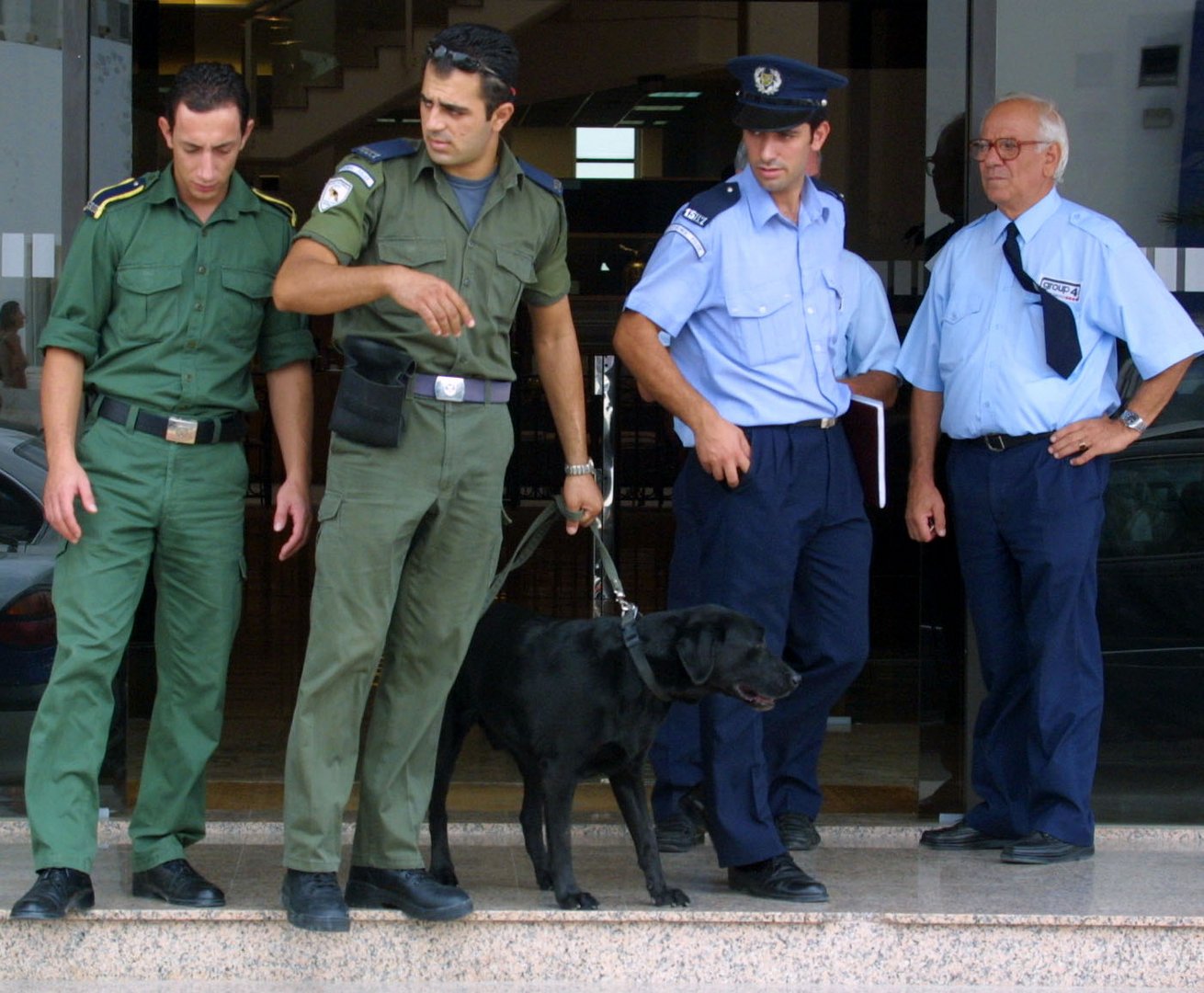 feature kyriacos police investigating a bomb threat at the stock exchange in 2001