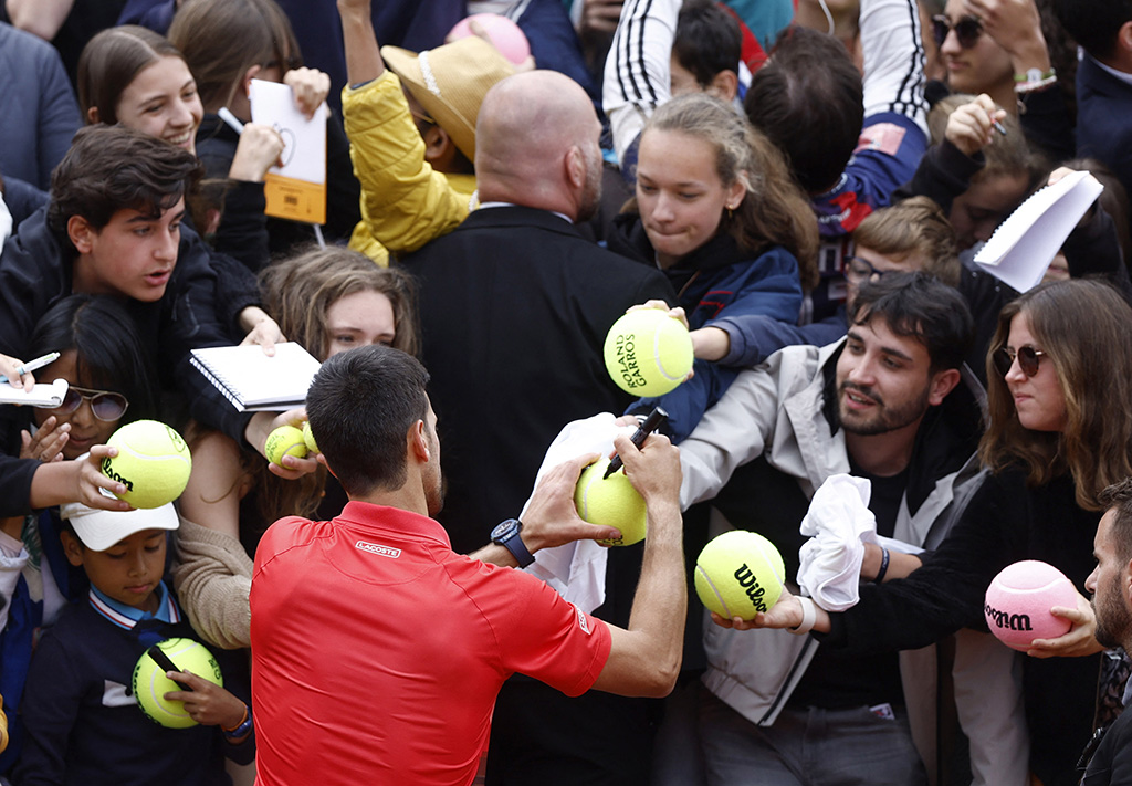 image Impressive Djokovic canters into French Open last eight, Nadal clash looms