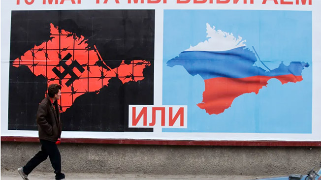 image Russian spy boss compares US to Nazi propaganda machine