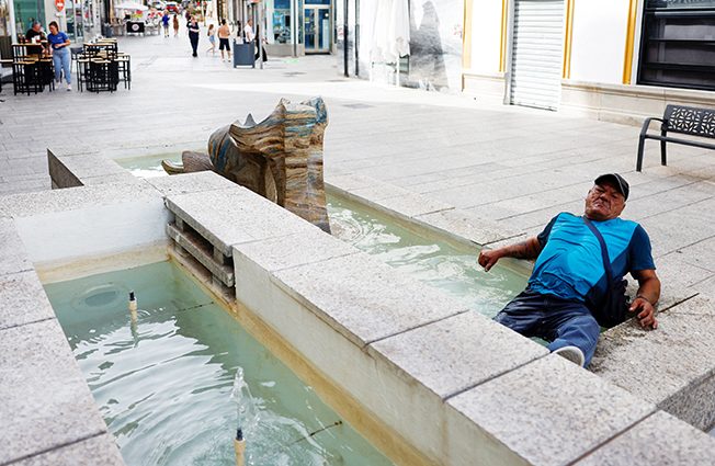 image Europeans pant in early summer heatwave compounding climate change fears