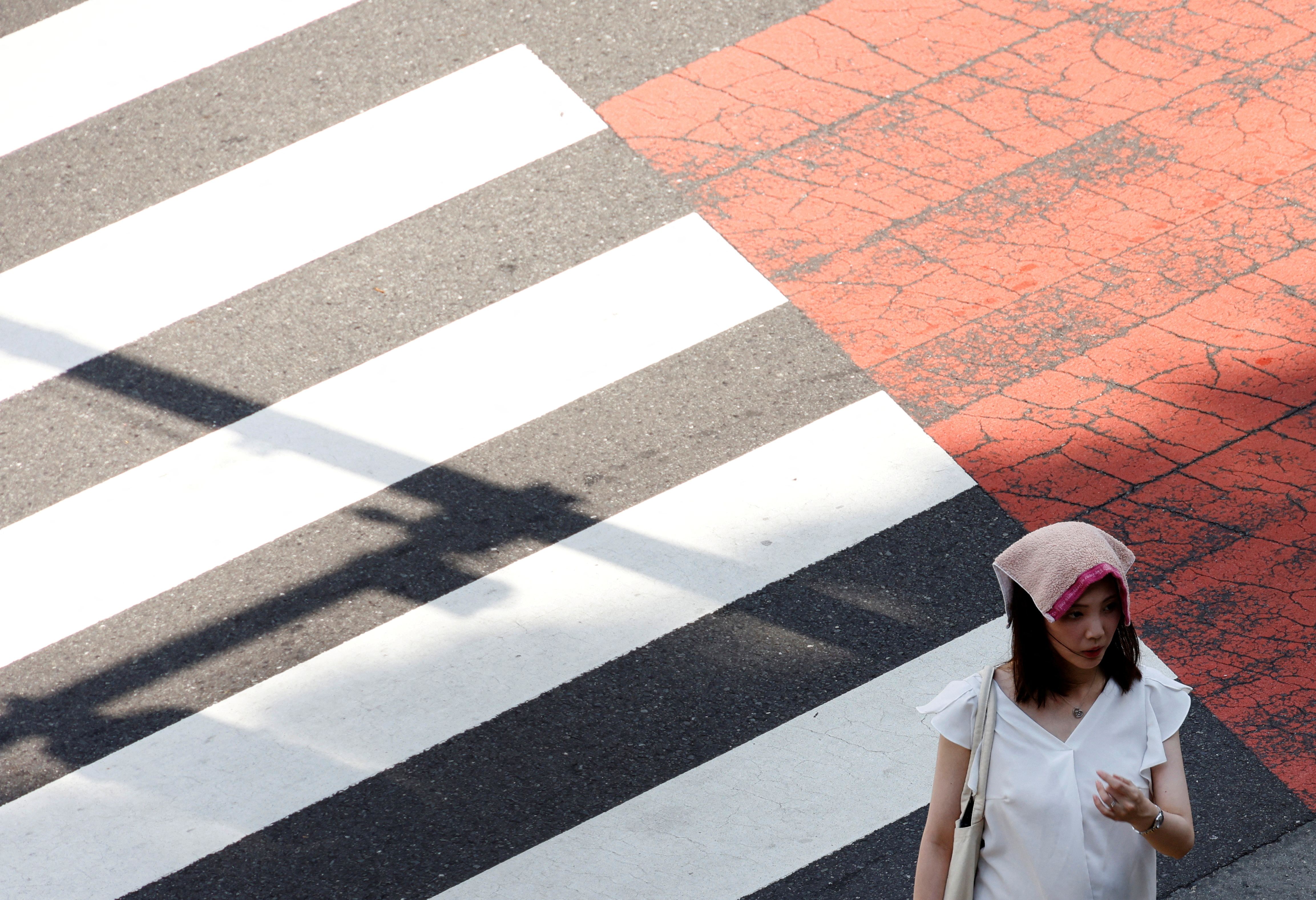 image Tokyo June heatwave worst since 1875 as power supply creaks under strain