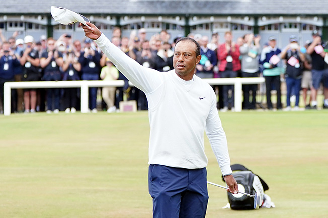 image Smith breaks Open record as Tiger makes emotional early exit