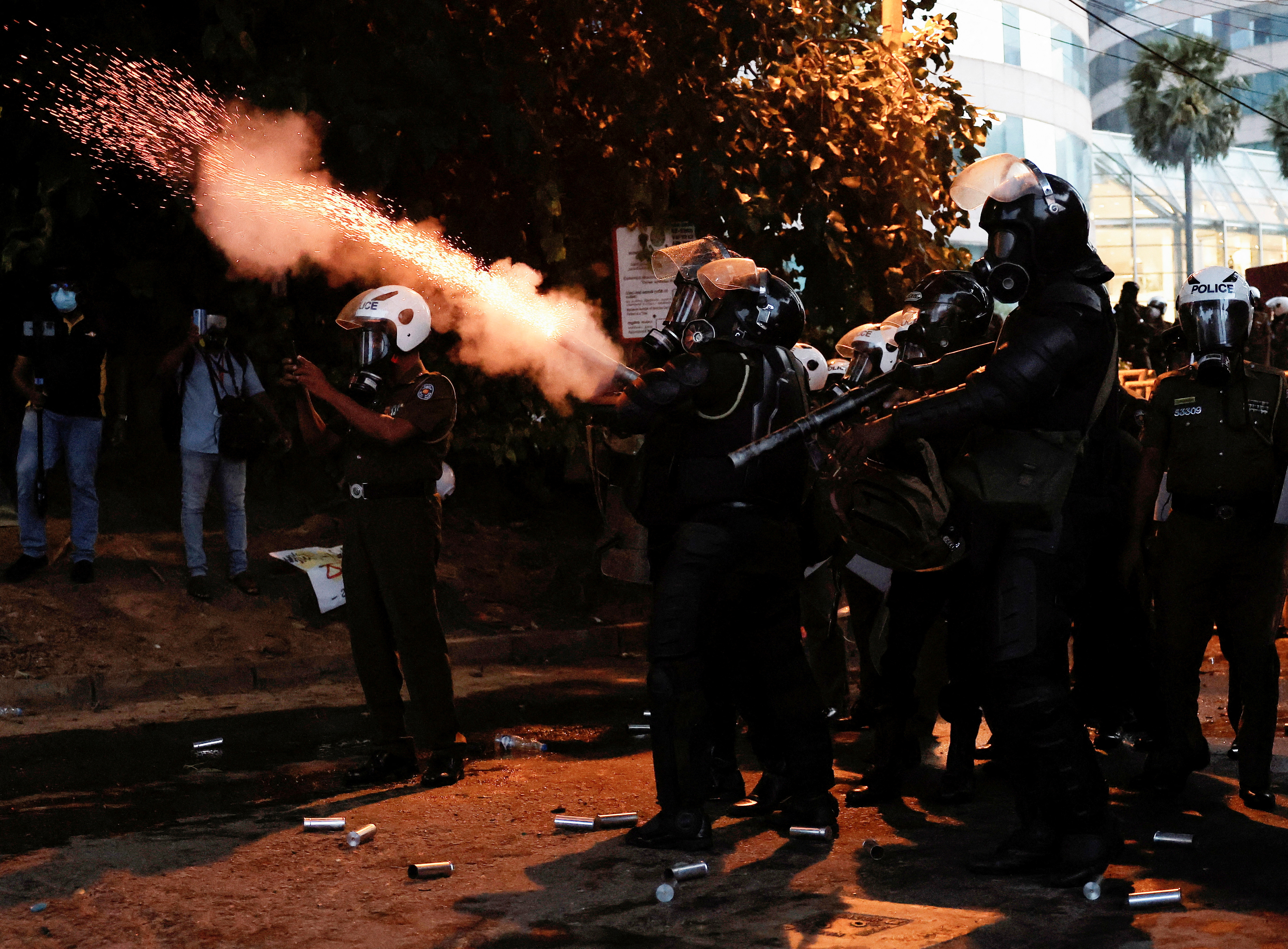 image Sri Lanka police impose curfew, fire tear gas as unrest escalates