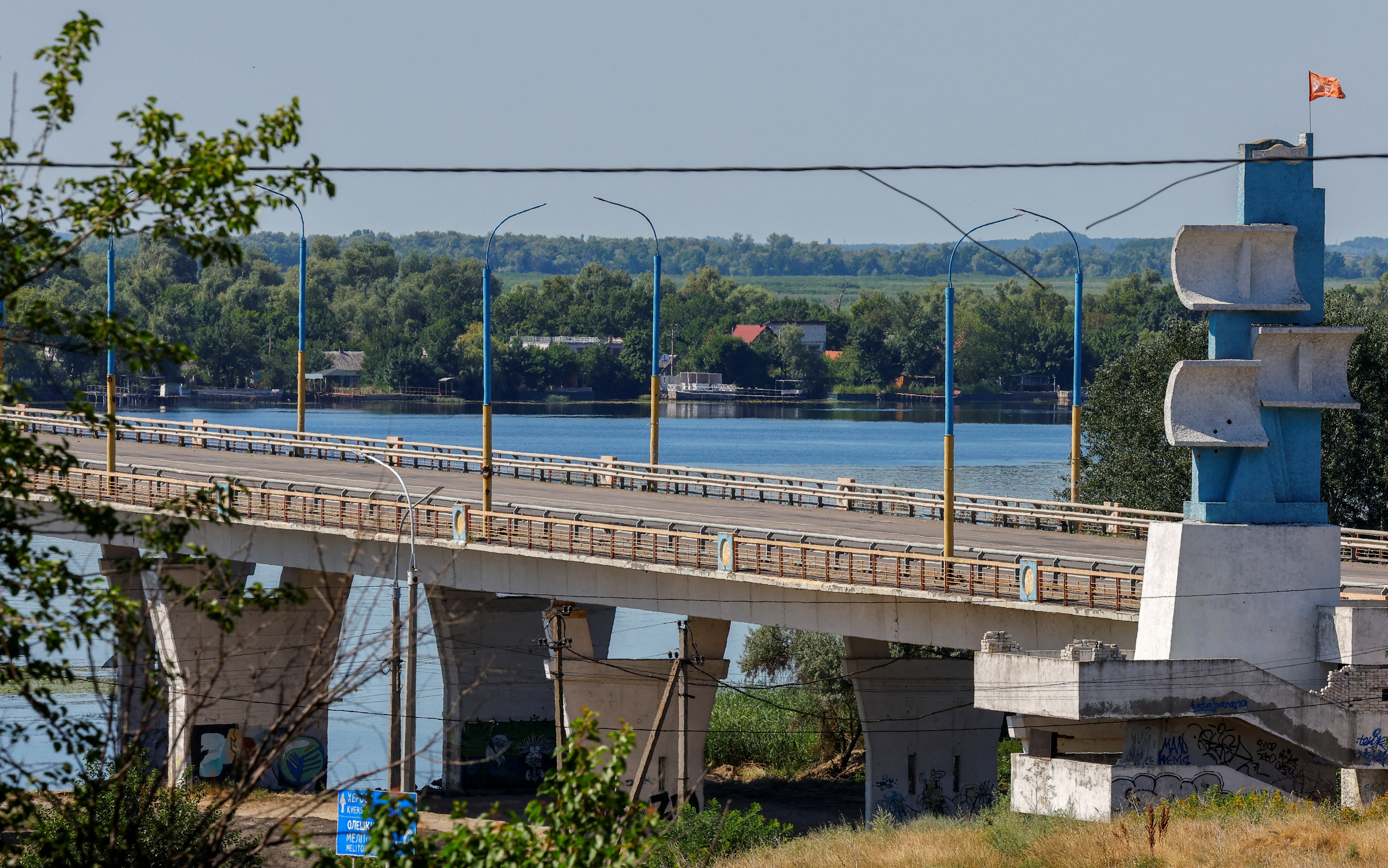 image Bridge closed in Russia-held Kherson after HIMARS shelling, official says