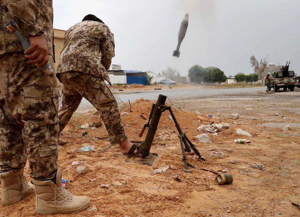 image Fighting rips through Libyan capital, killing 13