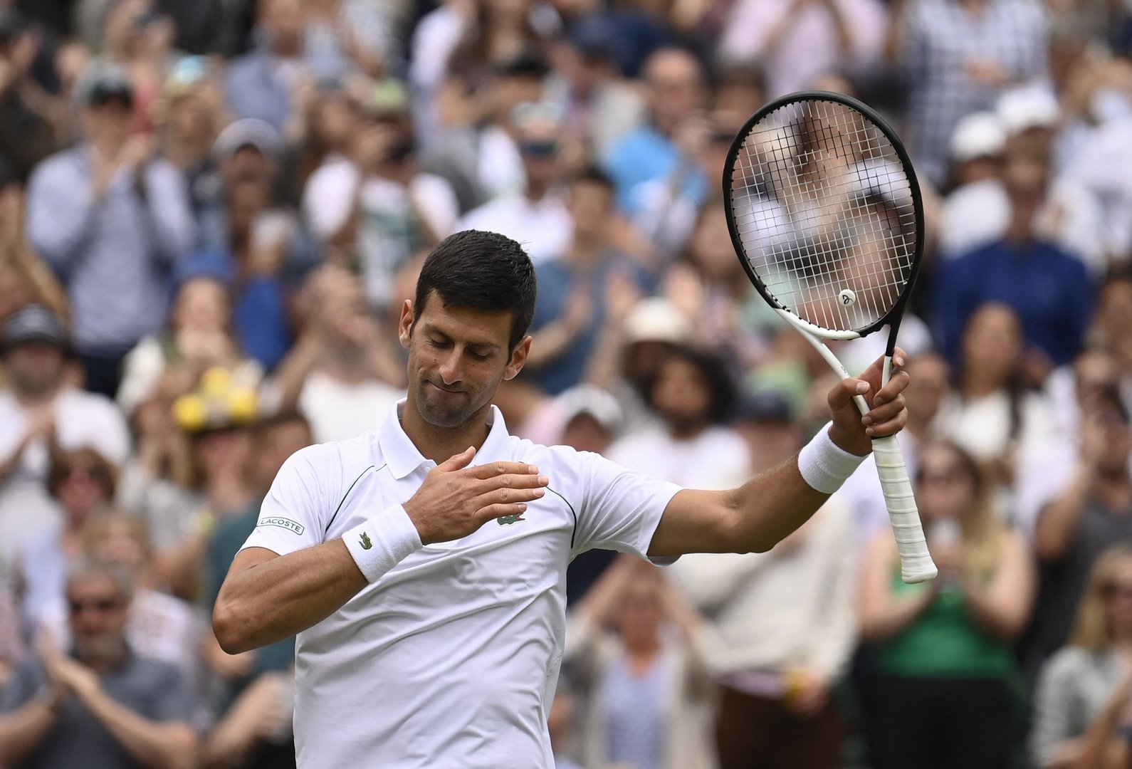 image Djokovic through to last 16 after schooling Kecmanovic
