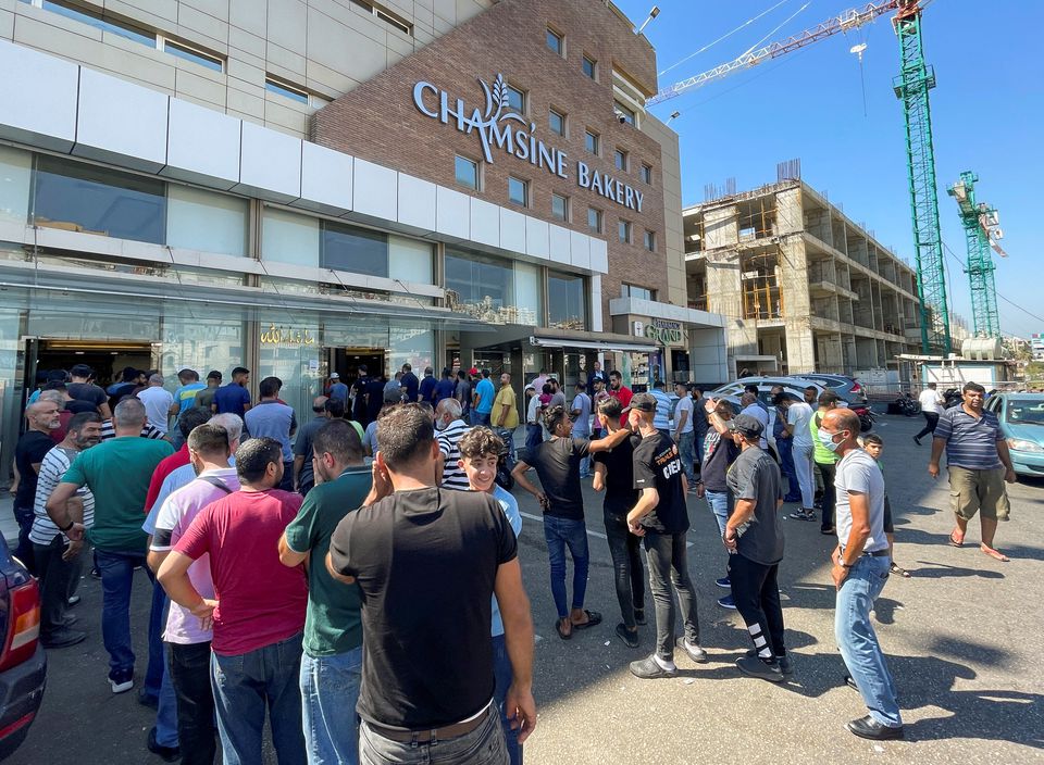 image As Lebanese staple runs short, tempers flare at bakeries