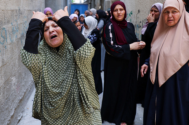 image Israel re-opens Gaza crossings as truce with Palestinians holds