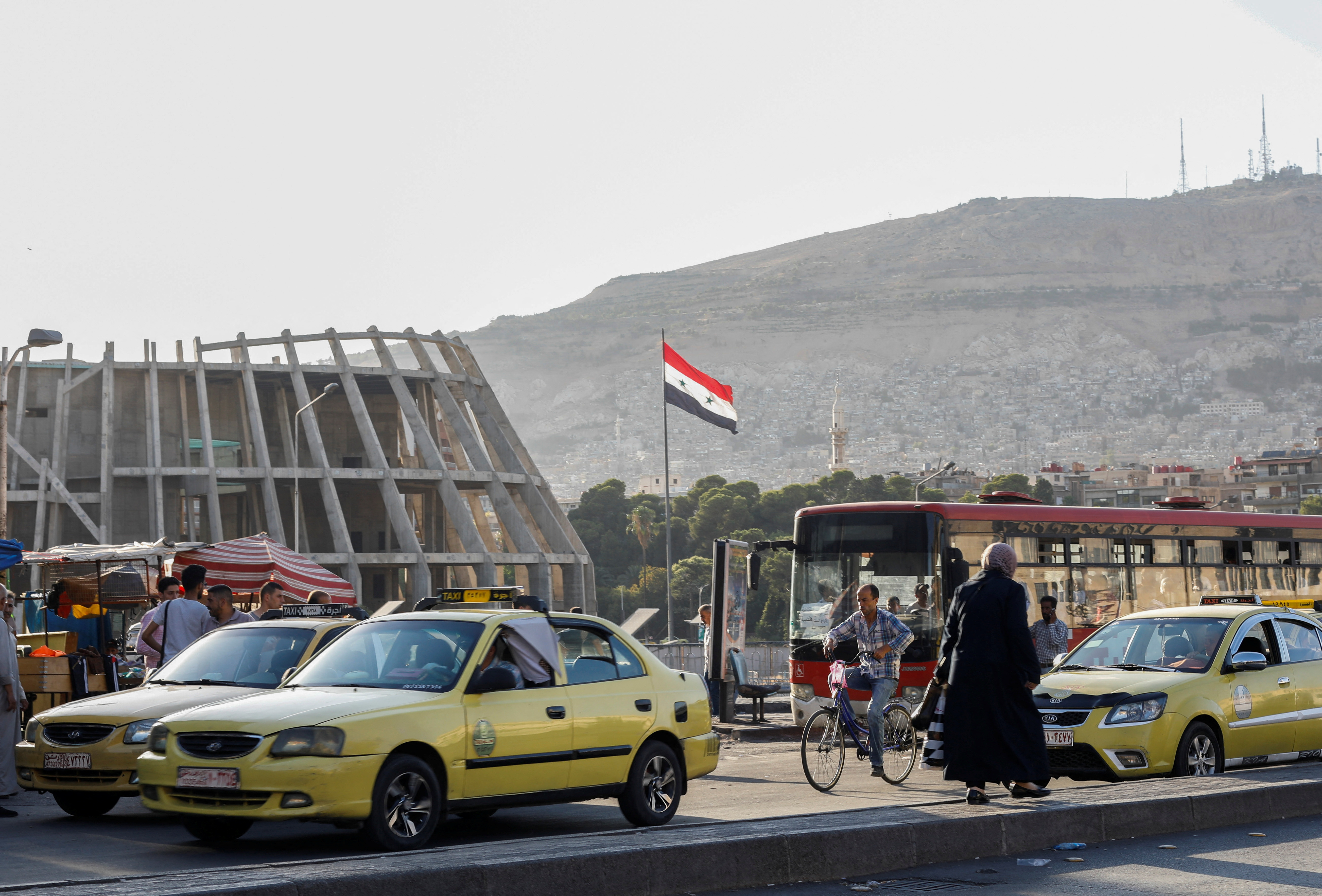 image At least 14 killed in shelling on north Syria market, rescuers say