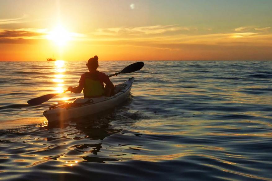 image Sea kayaking at magic hour