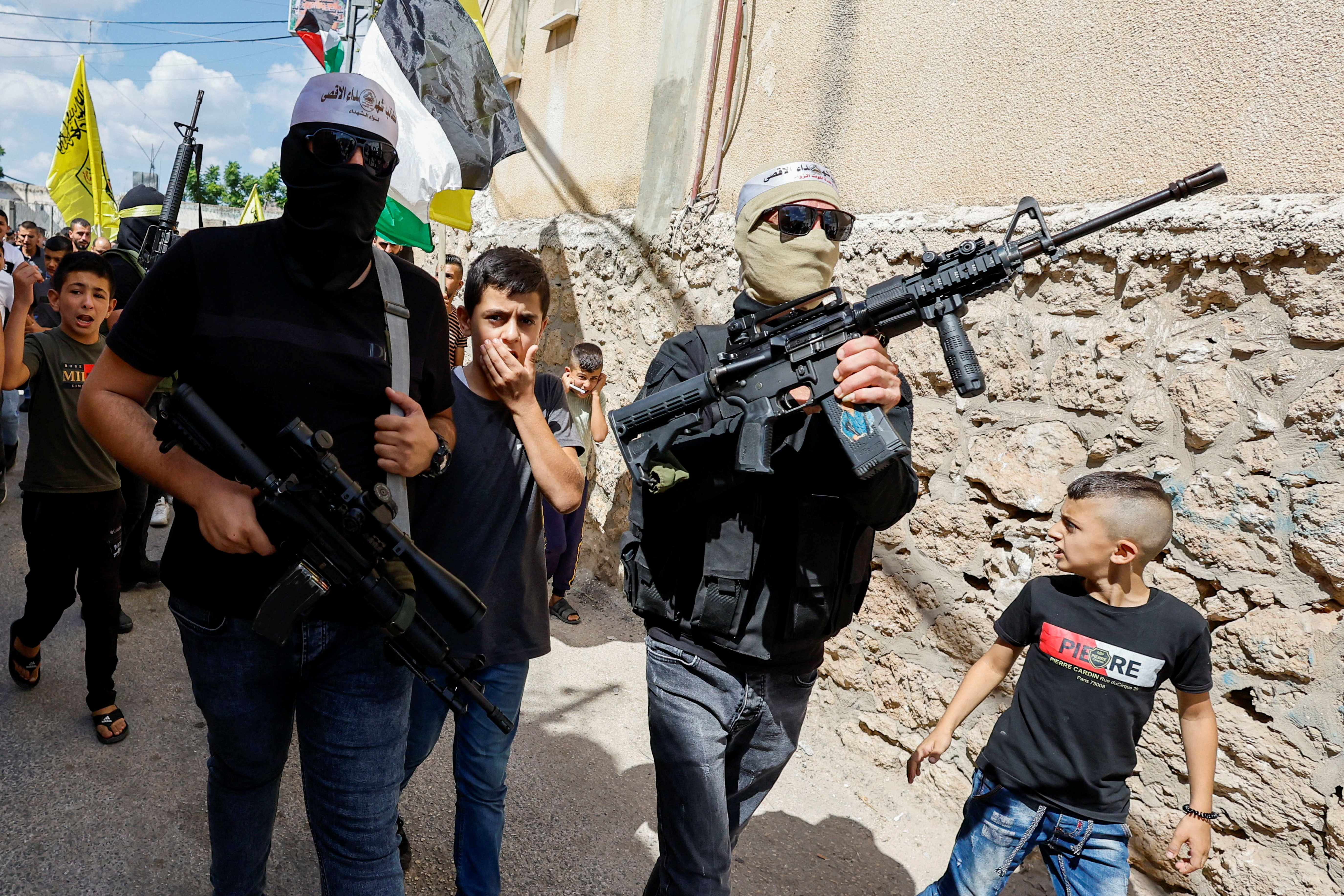 image Israeli-Palestinian violence simmers in West Bank with raids, clashes
