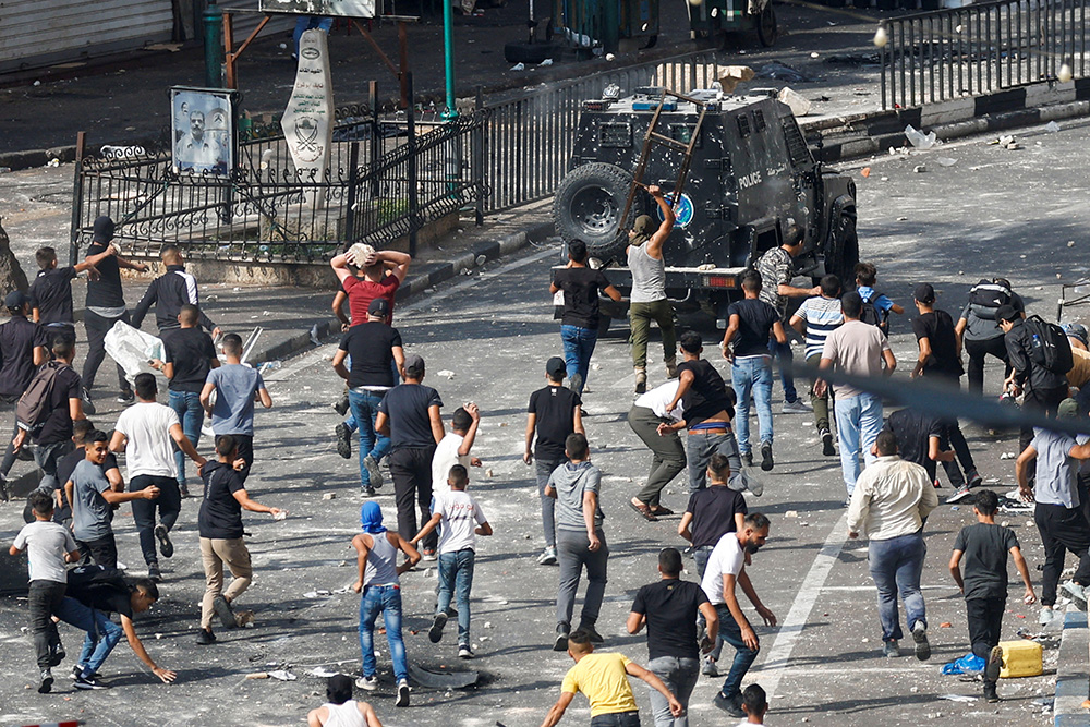 image Israeli forces kill two Palestinian teens in the West Bank, health officials say