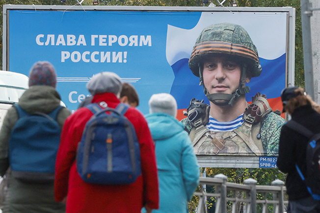 image Russia begins massive war call-up, spurring some men to flee