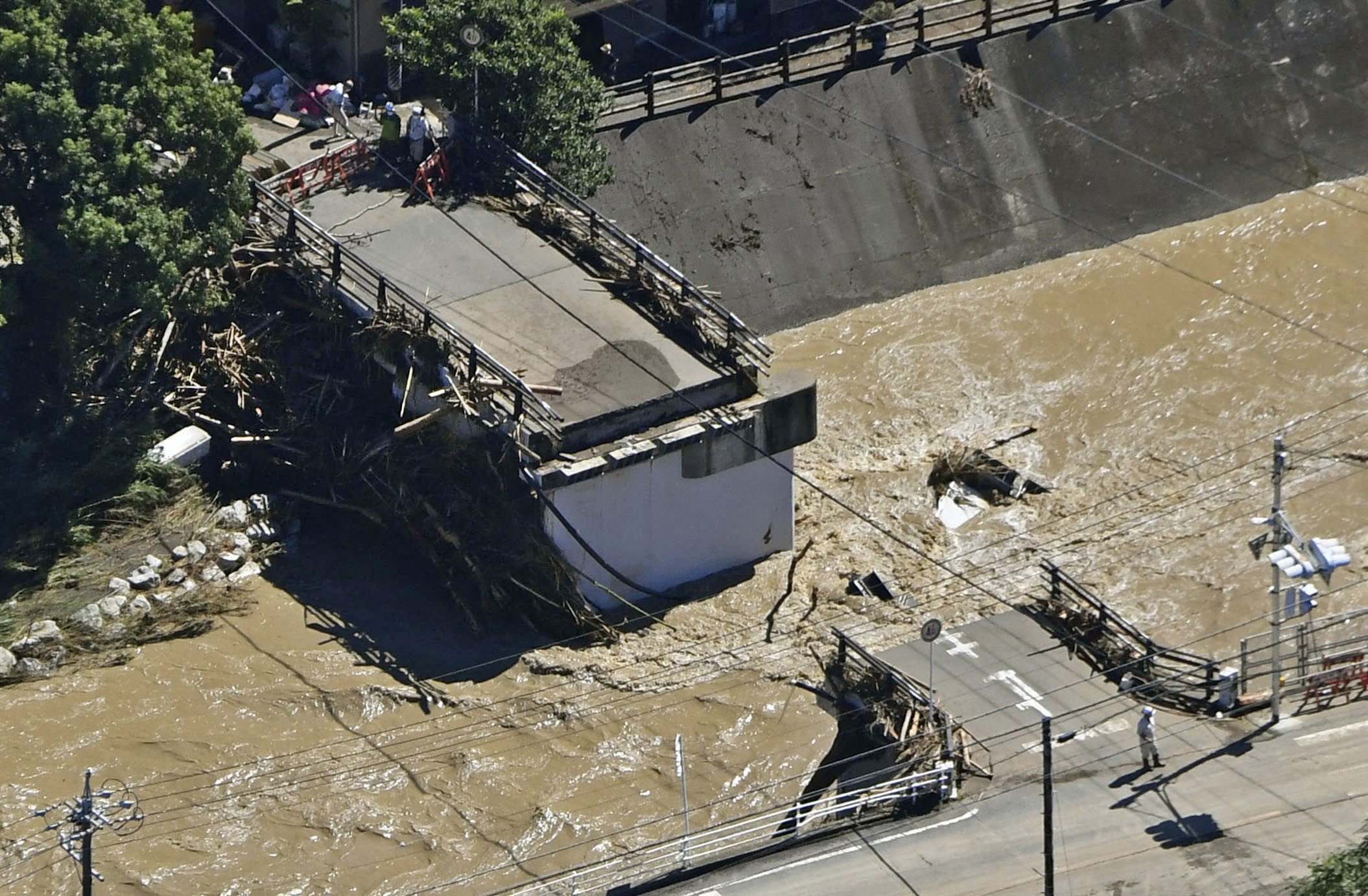 image Typhoon lashes central Japan killing two