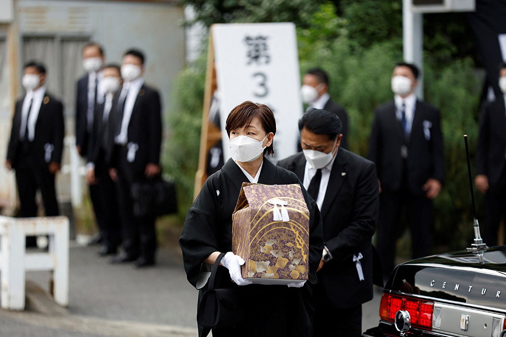 image With flowers and a gun salute, Japan bids farewell to slain Abe at state funeral