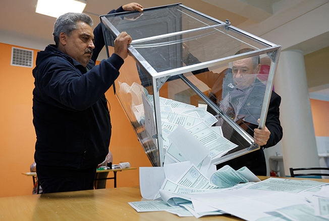 image Moscow&#8217;s proxies in occupied Ukraine regions report big votes to join Russia (Update)