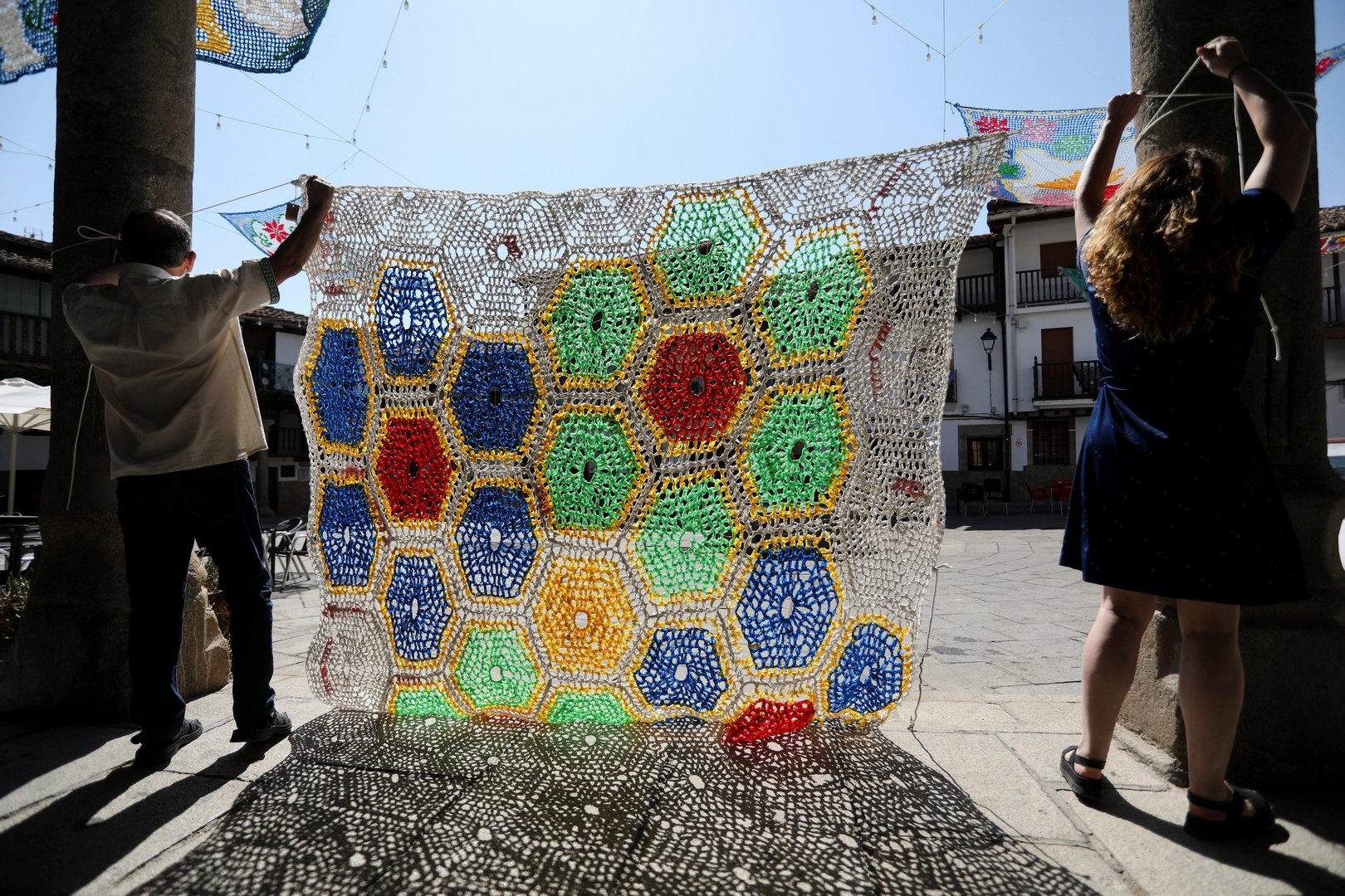 image Weavers recycle shopping bags to shield Spanish village from sun
