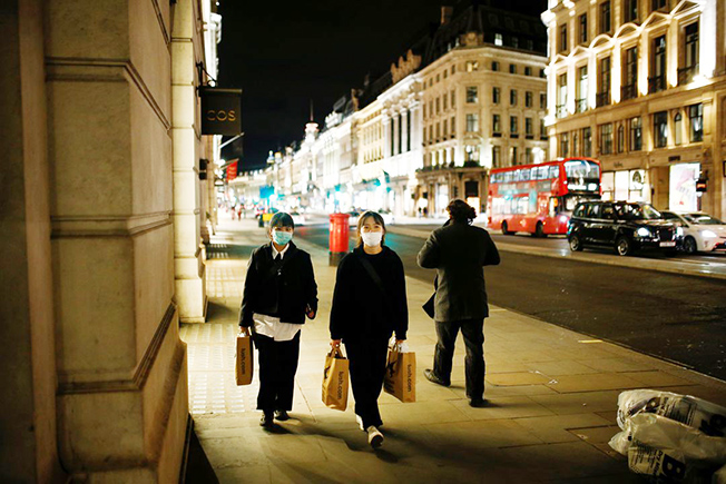 image British health officials warn of difficult winter with &#8216;twindemic&#8217;