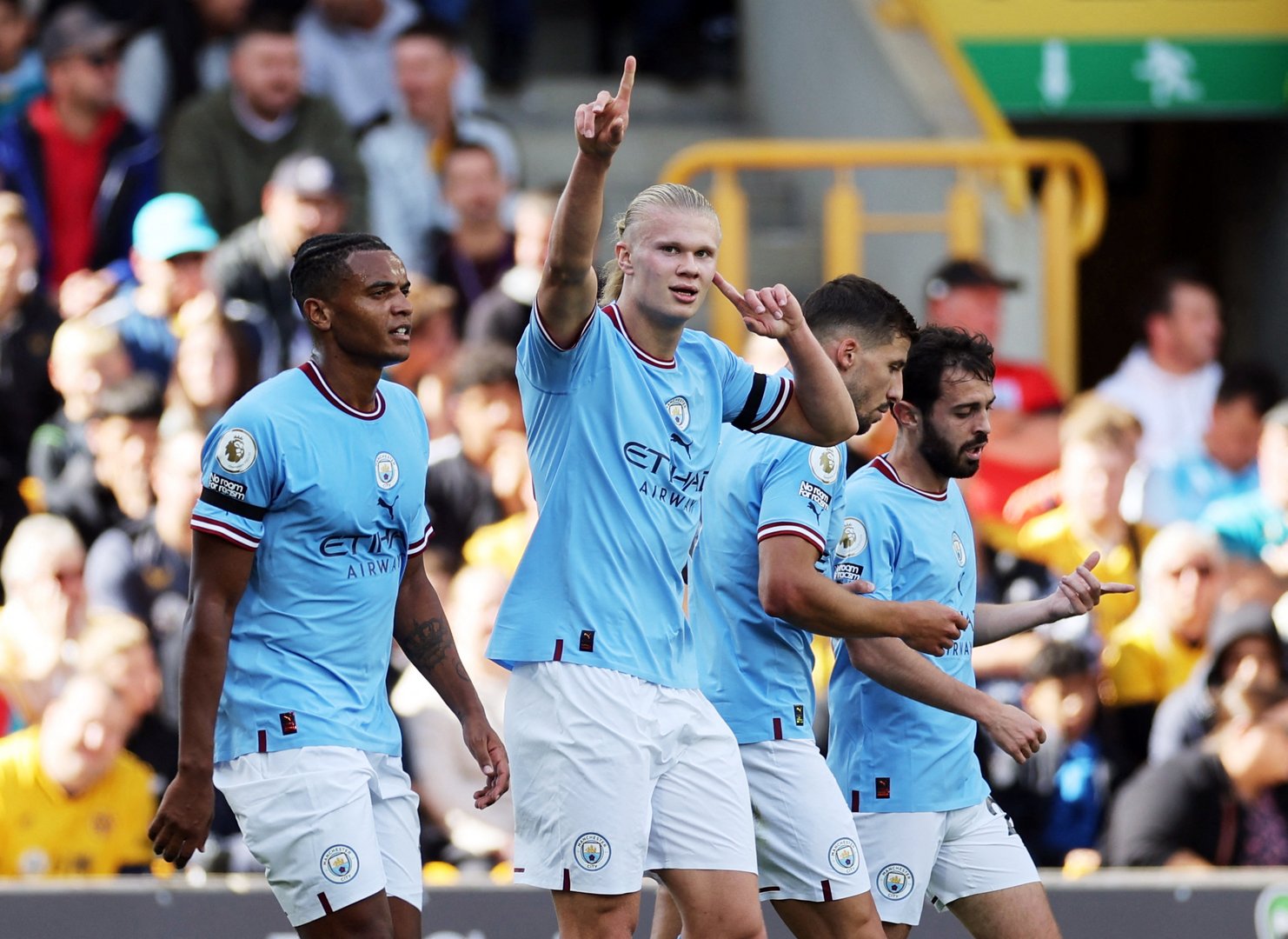 image Early Grealish, Haaland goals ease Man City to win at 10-man Wolves