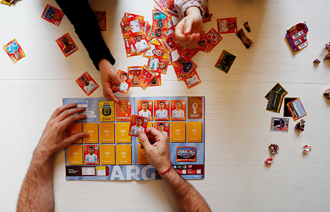 image In land of Maradona and Messi, fans jostle for World Cup stickers