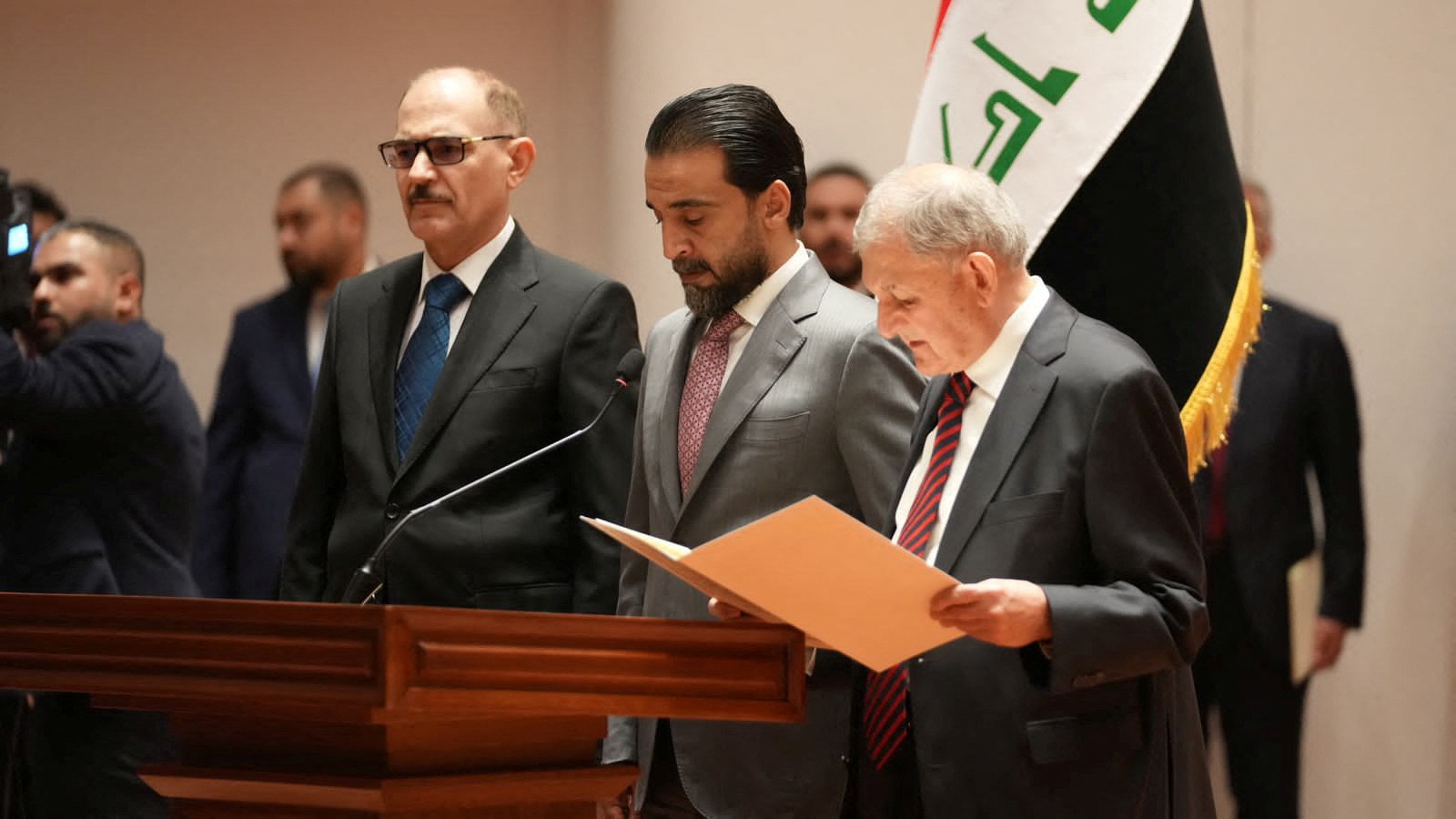 image Iraq elects new president and premier, ending stalemate