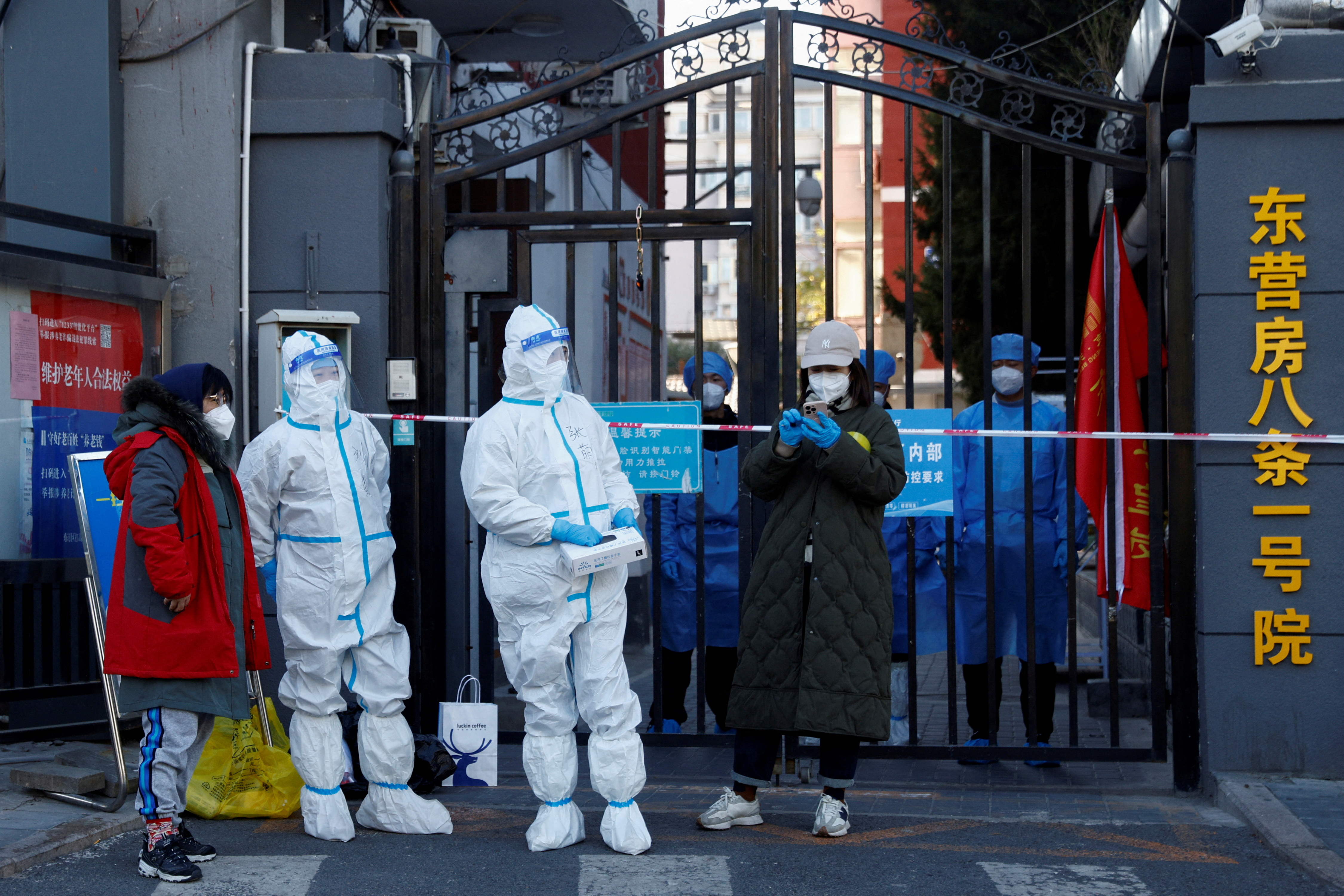 image Chinese cities double down on curbs as Covid outbreaks widen