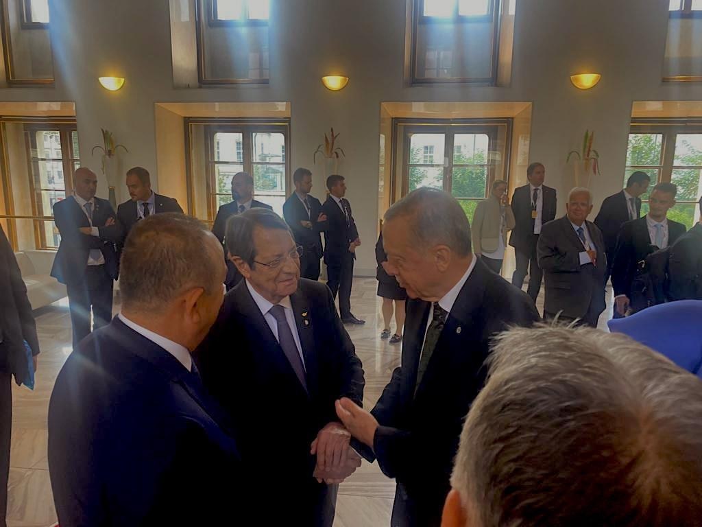 image Anastasiades chats briefly with Erdogan in Prague