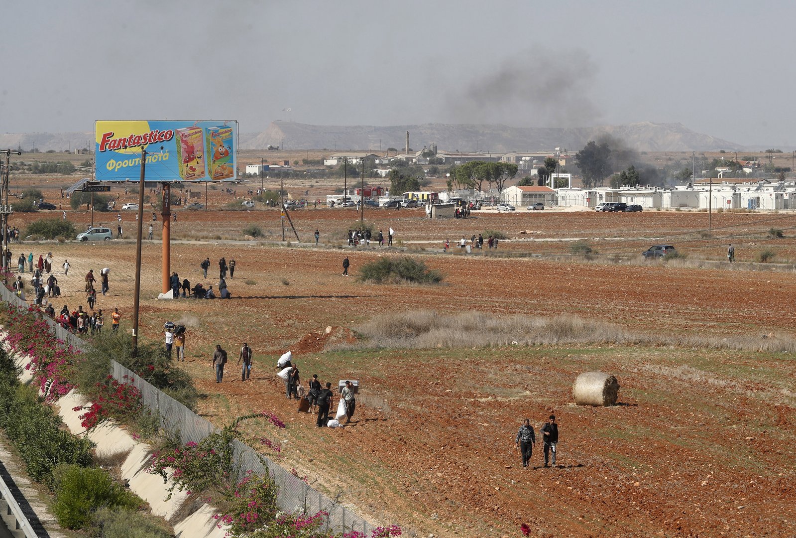 image ‘Police cannot be everywhere’ official says after clashes at migrant camp