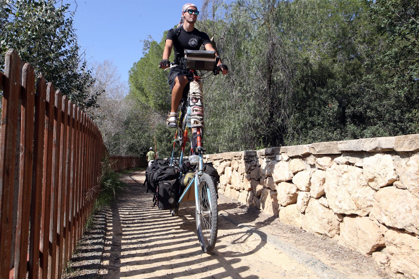 image Taking on the world by tall bike