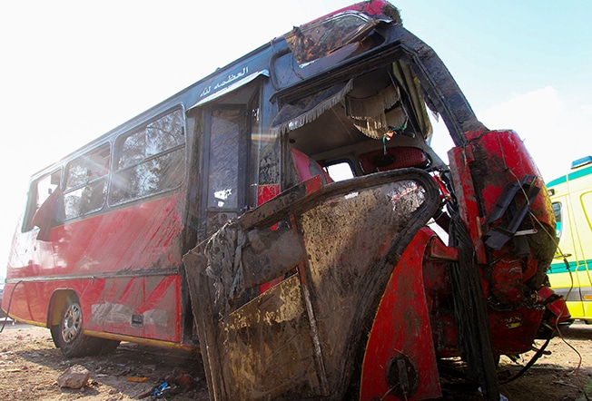 image Nineteen dead in Egypt after bus falls into canal