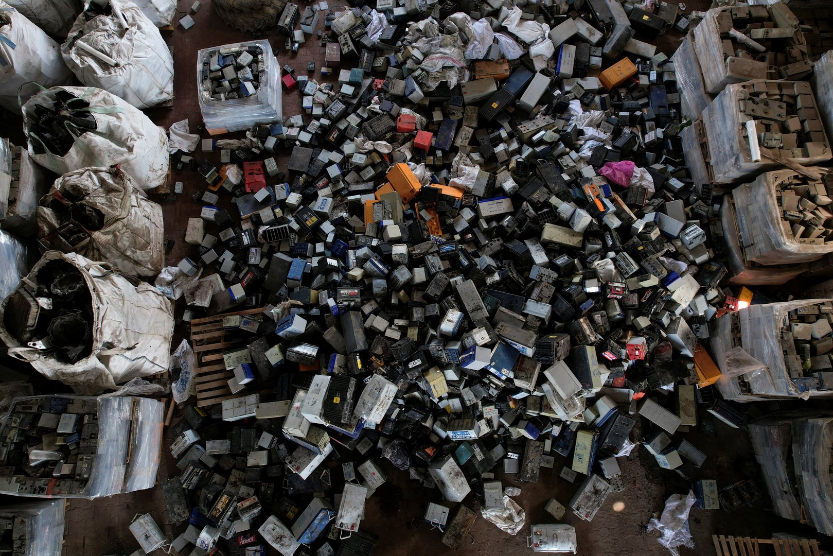 image In power-starved Gaza&#8217;s scrapyards, batteries keep piling up