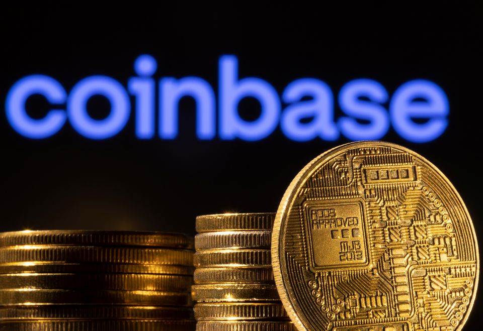 image Coinbase reports third-quarter loss as volumes drop