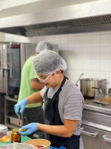 feature theo food being prepared for delivery in misfit union