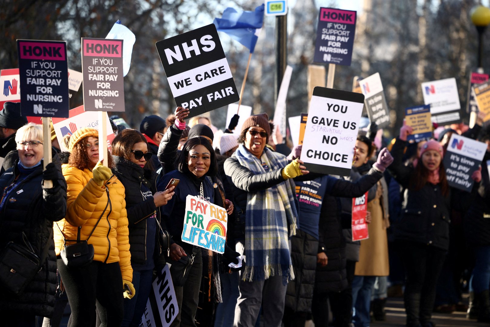image British nurses walk out again, threaten further strikes in pay dispute