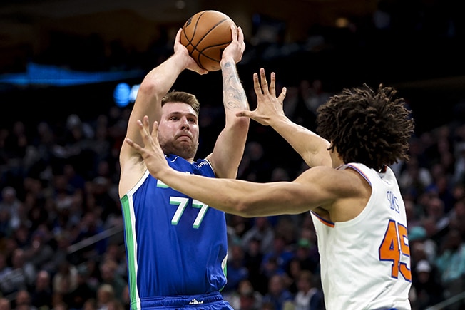 image Doncic&#8217;s historic triple-double helps Mavs to improbable win over Knicks