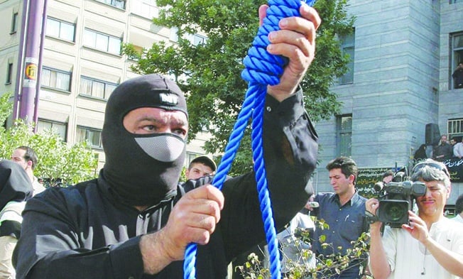 image Iran sentences three more protesters to death amid international criticism