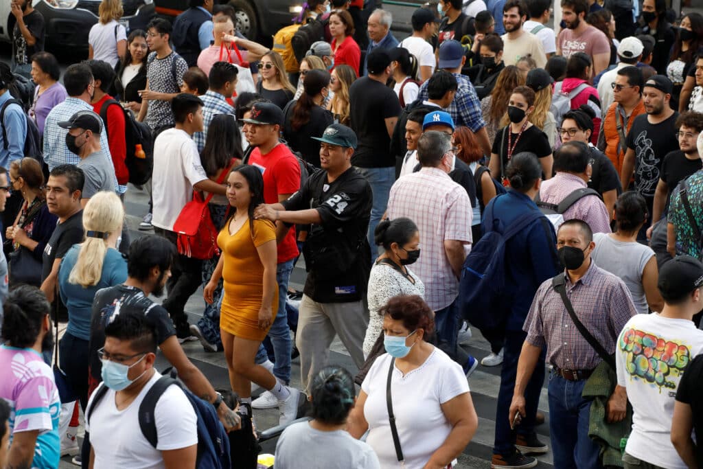 people walk in the downtown of mexico city