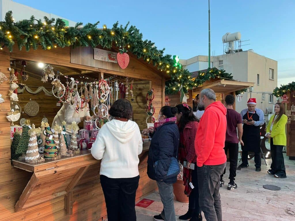 feature gina dherynia christmas village
