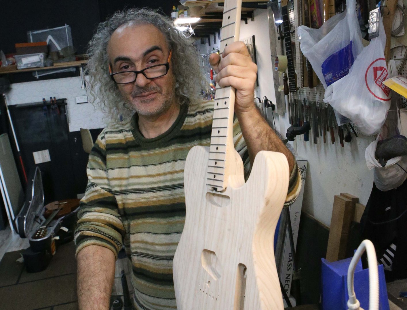 image Guitar-maker &#8220;Dr Fret&#8221; bringing lumps of wood back to life