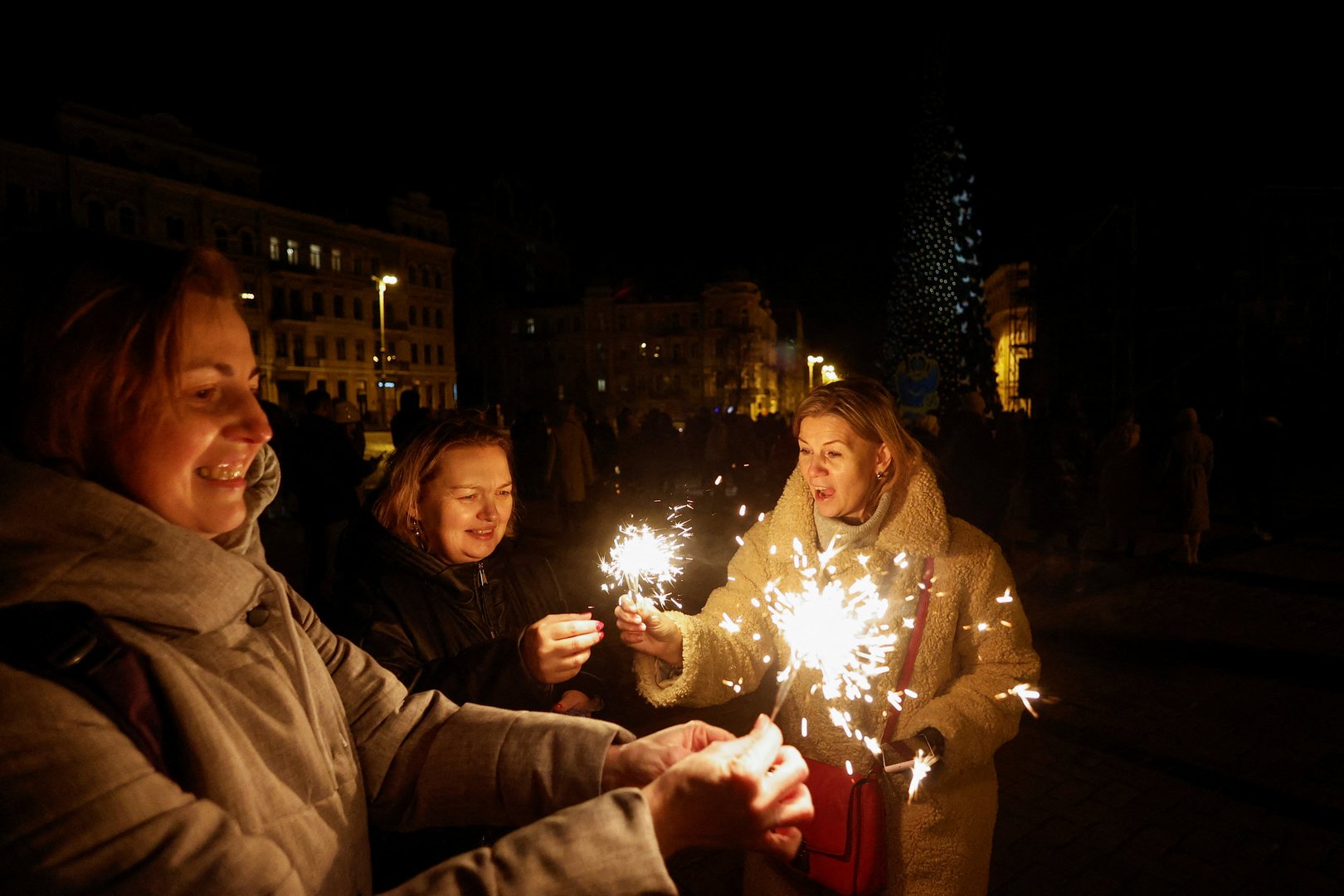 image Zelenskiy, Putin promise victory in contrasting New Year speeches