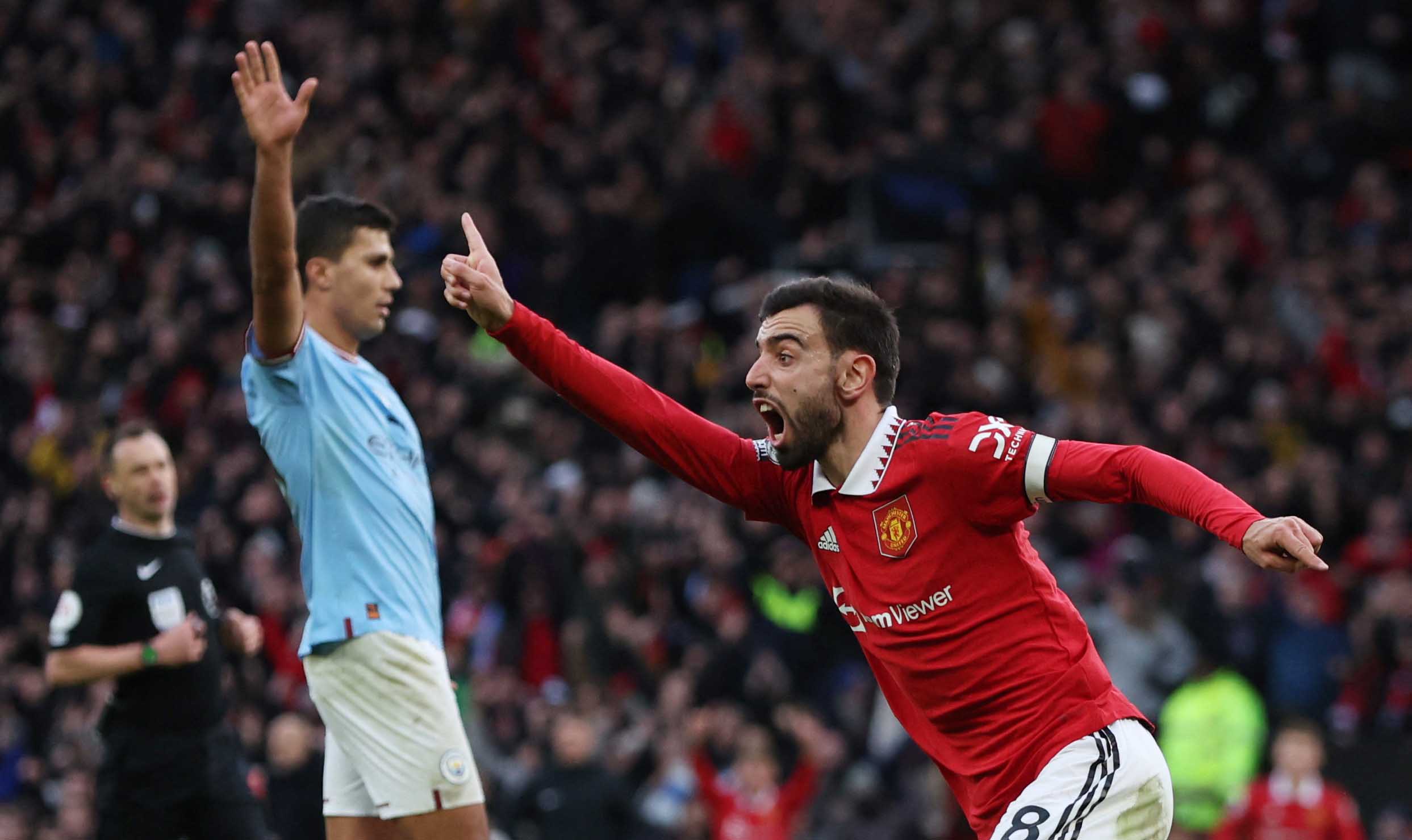 image Rashford the hero again as Man United come back to beat Man City in dramatic derby