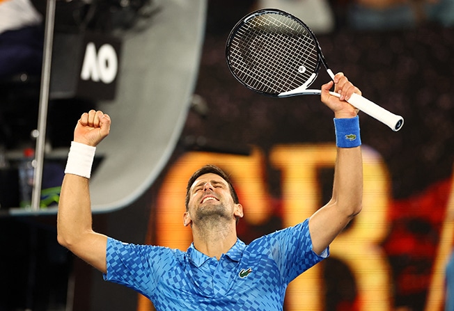 image Djokovic back in old routine as weather disrupts Aussie Open
