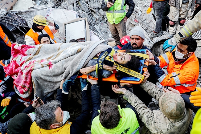 image Rescuers toil on in rubble; survivors ever harder to find