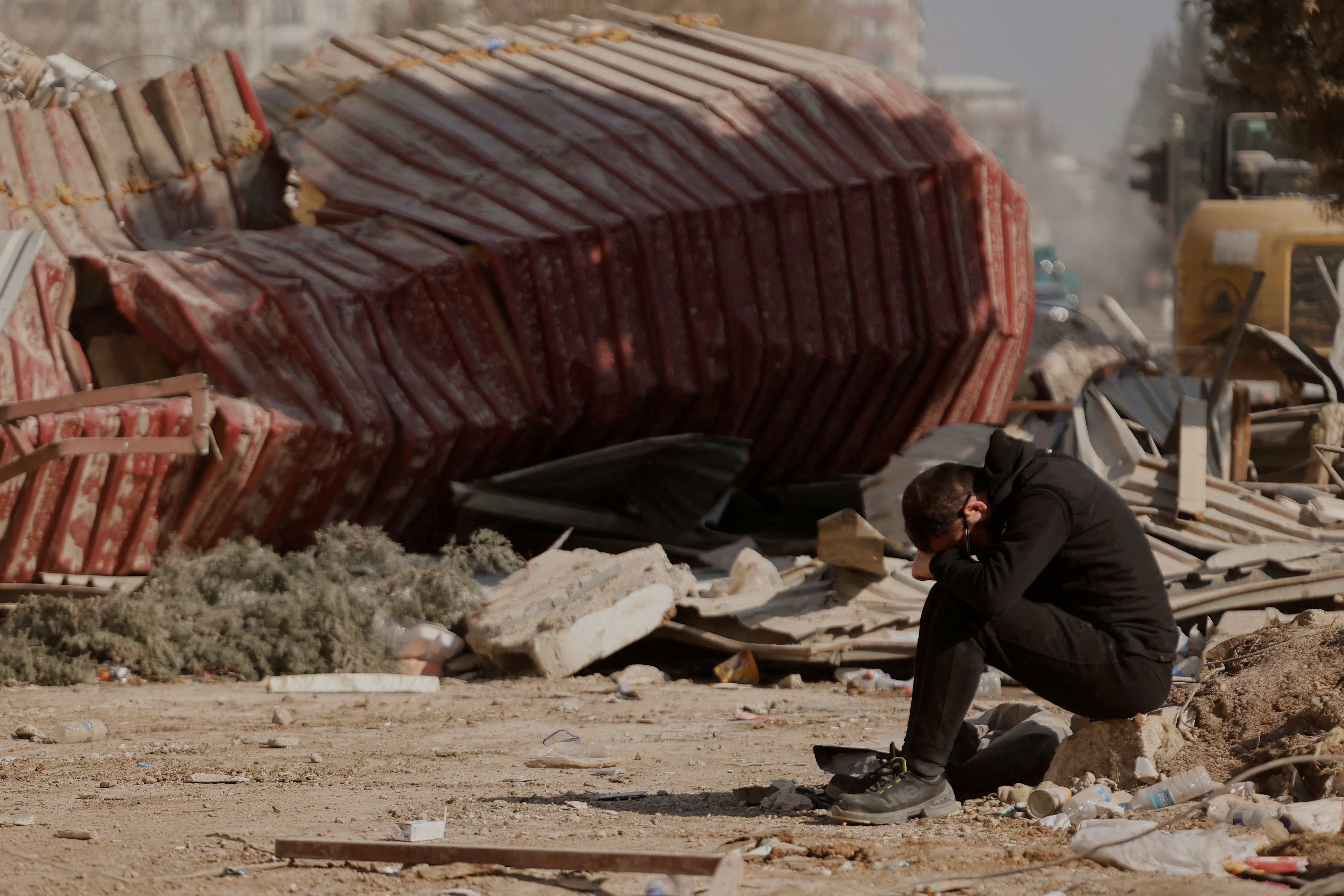 image Survivors dug out of rubble in Turkey, but many families pray to find a body to mourn