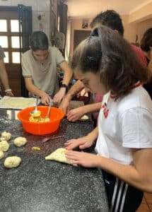 making flaounes with her greek cypriot family