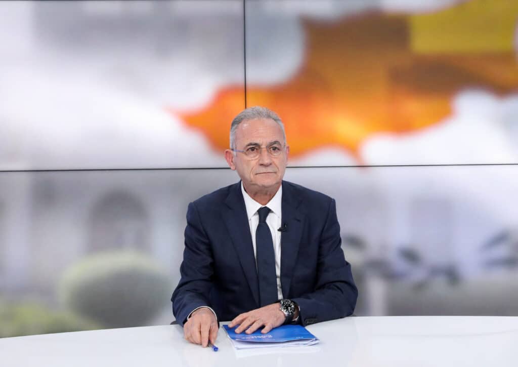 cyprus presidential candidate averof neophytou, head of the governing right wing democratic rally party, attends a televised debate in nicosia