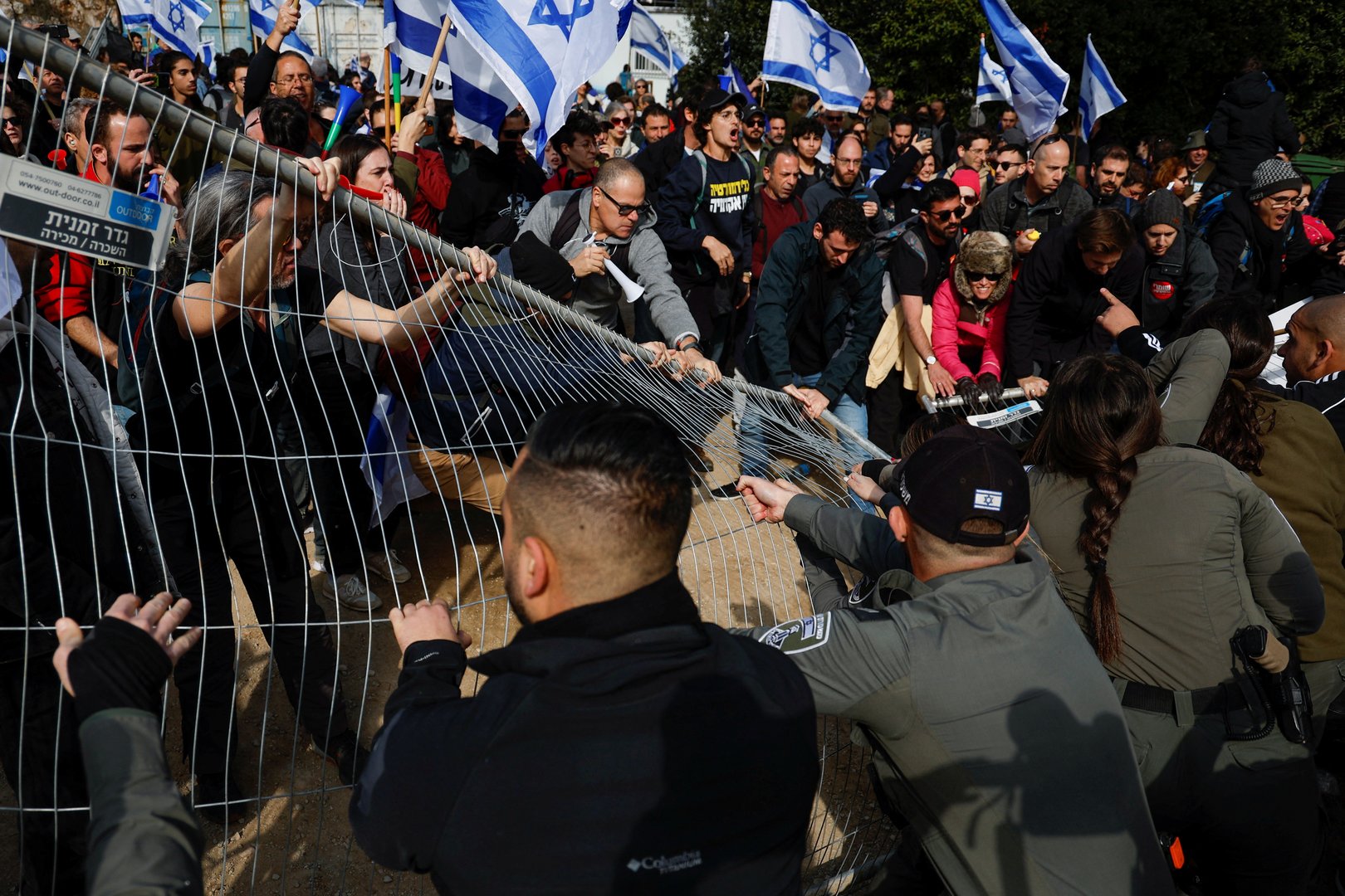 image Israeli parliament in uproar over Netanyahu justice plans as thousands protest