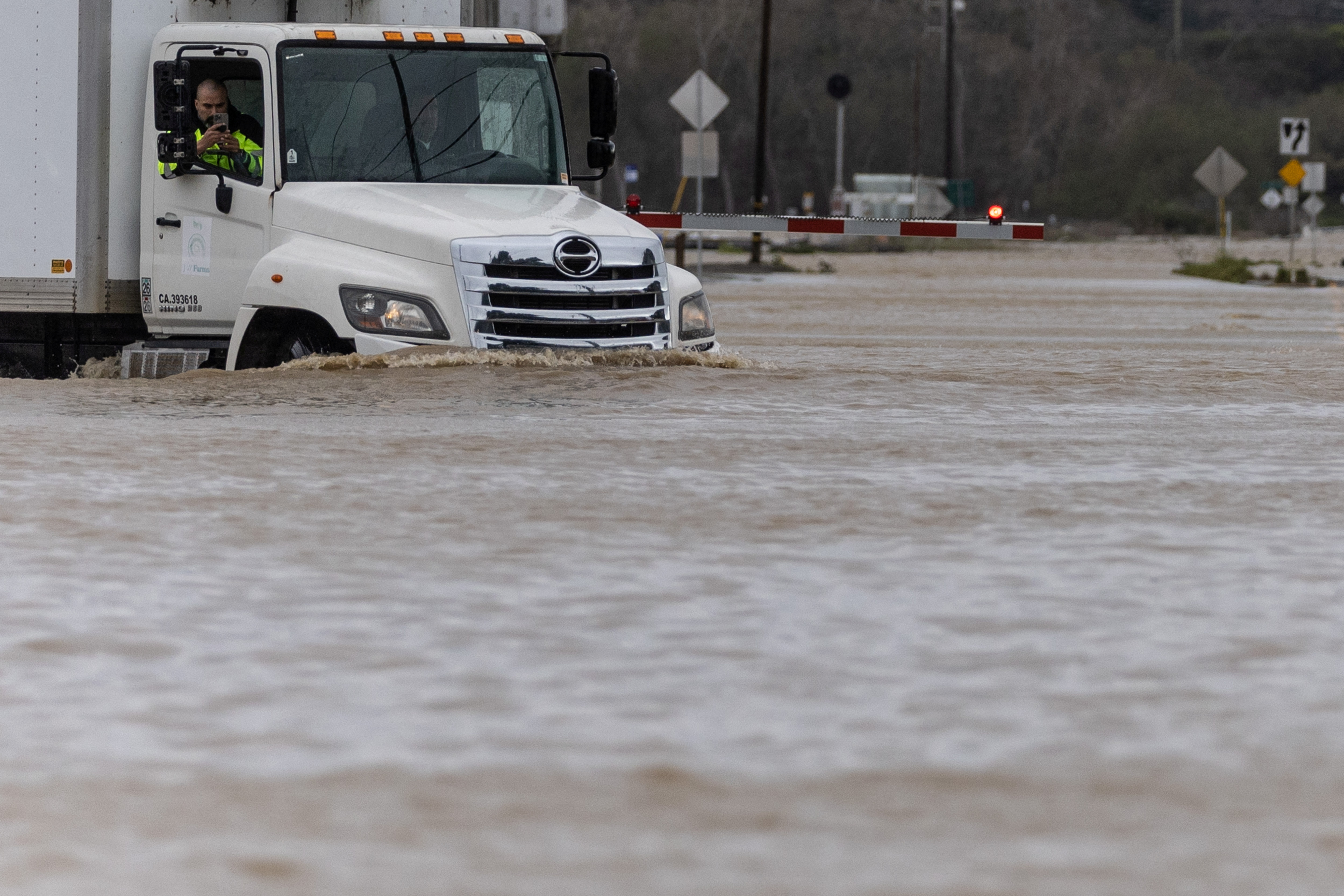image Soggy California drenched anew as Nor&#8217;easter buries New England, New York