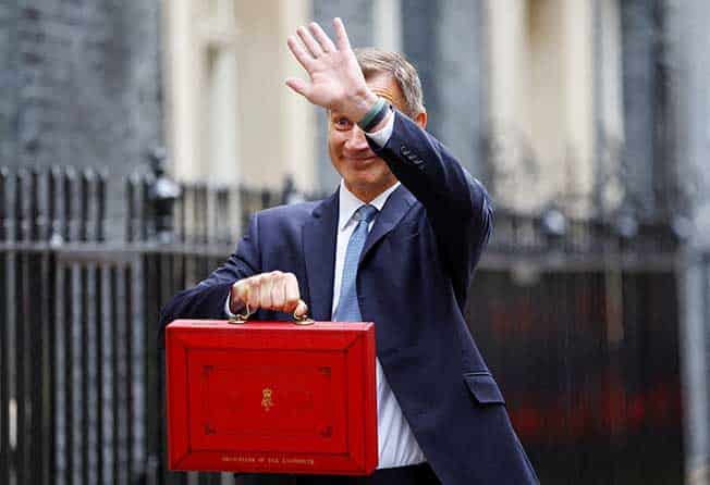 image UK budget: Economy to avoid recession this year, Hunt says