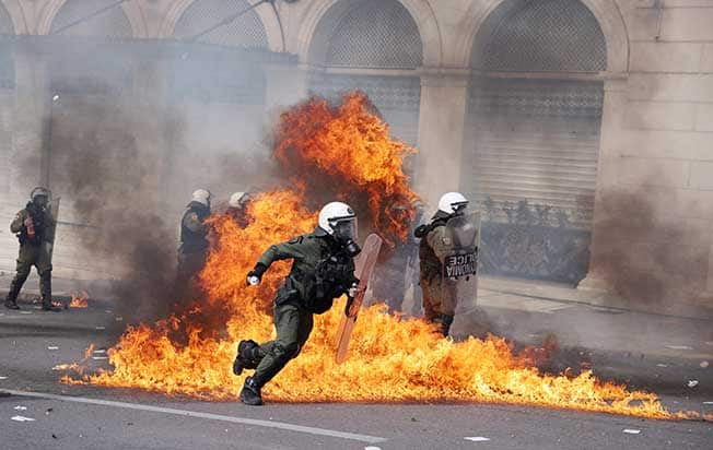 image Striking Greeks protest over deadly train crash